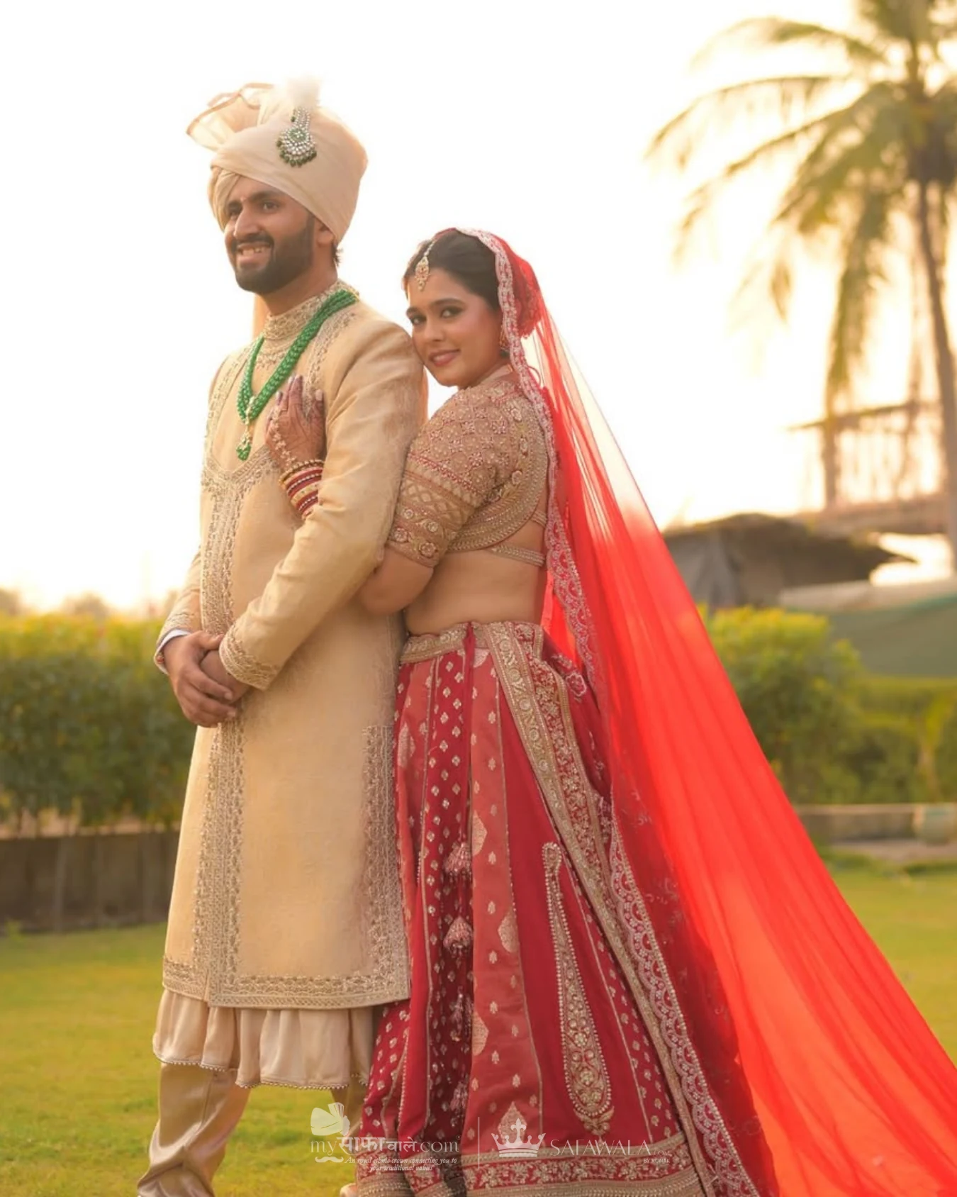 Classic groom pagdi styled with a red ceremonial stole for Bel Air