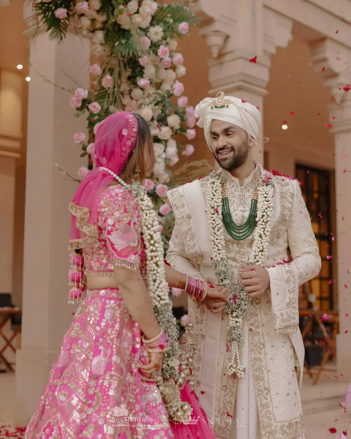 wedding safa wala in Bel Air – Close detail of a red wedding safa with an emerald kalgi